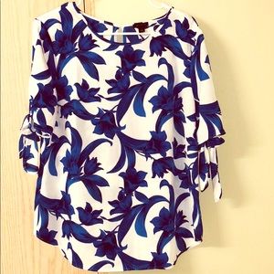Ann Taylor blue flower top with tie on the sleeves